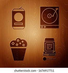 Set Karaoke , Beer can , Popcorn in cardboard box  and Vinyl player with a vinyl disk  on wooden background. Vector
