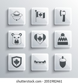 Set Kayak, Acorn, Beanie hat, Heart shaped Canada flag, on shield, Beaver animal, Canadian ranger and Wooden axe icon. Vector