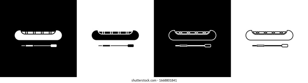 Set Kayak and paddle icon isolated on black and white background. Kayak and canoe for fishing and tourism. Outdoor activities.  Vector Illustration