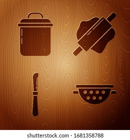 Set Kitchen colander , Cooking pot , Knife  and Rolling pin  on wooden background. Vector