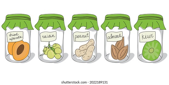 A set of kitchen jars with green croutons containing dried fruits and nuts