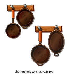 A set of kitchen utensils made of cast iron. Vector.