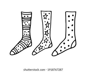 A set of knitted Christmas socks with a festive pattern. Vector illustration drawn by contour lines on a white background in doodle style.