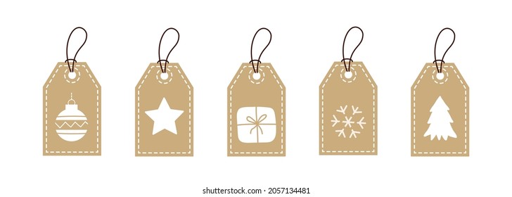 Set of kraft paper tags with white christmas elements isolated on a white background. Modern vector illustration