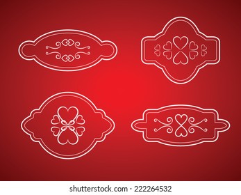 Set of labels and calligraphic design with heart elements on red background