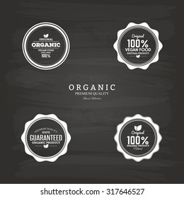 Set of labels on a black background for organic products