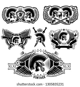 Set of labels with Spartan helmets, wreathes, sword and wing. Heraldic vintage elements on white background