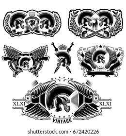 Set of labels with Spartan helmets, wreathes, sword, animals and wing. Heraldic vintage elements on white