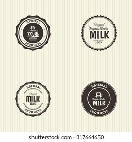 Set of labels with text and icons for milk products