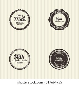 Set of labels with text and icons for milk products
