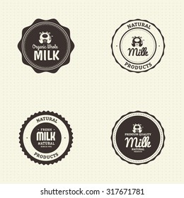 Set of labels with text and icons for milk products