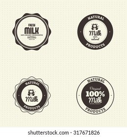 Set of labels with text and icons for milk products