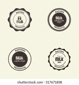 Set of labels with text and icons for milk products