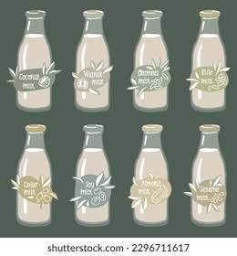 A set of labels for vegetable milk on glass bottles. Coconut, almonds, soy, walnut, rice, oatmeal, etc. Vector. A set of different types of vegetable milk - almond, rice, coconut, soy. Vegan