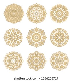 Set of laced golden vector decorative elements, rosettes on white background