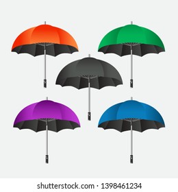 The set of Ladies and men fashion accessories open realistic umbrellas isolated on grey background. vector illustration can be used for topics weather, rain, collection, fashion.
