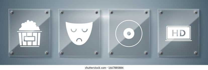 Set Laptop screen with HD video technology , CD or DVD disk , Drama theatrical mask  and Popcorn in cardboard box . Square glass panels. Vector