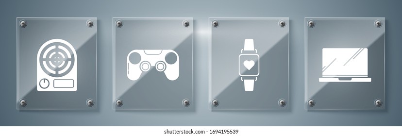 Set Laptop , Smart watch showing heart beat rate , Gamepad  and Electric heater . Square glass panels. Vector