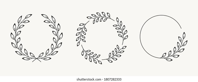 Set of laurel wreath design elements. Black circle border vector ornaments.