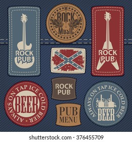 set of leather labels on denim on the theme pub with live music