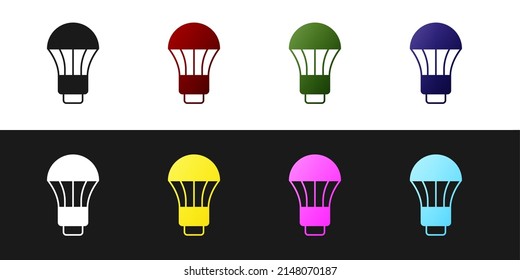 Set LED light bulb icon isolated on black and white background. Economical LED illuminated lightbulb. Save energy lamp. Vector