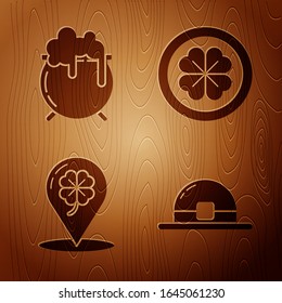 Set Leprechaun hat, Witch cauldron, Location and four leaf clover and Gold coin with four leaf clover on wooden background. Vector