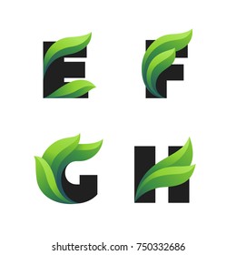 Set of letters icons with green leaves: E, F, G, H. Vector eco design.