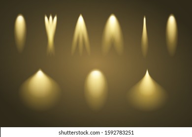 Set of light beams. Vector illustration. Gold illumination.