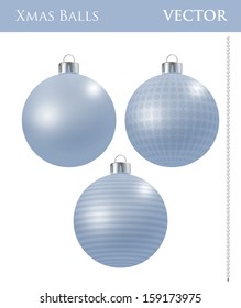 A set of light blue Christmas balls with different ornaments