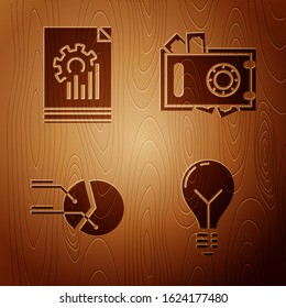 Set Light bulb with concept of idea, Document with graph chart, Pie chart infographic and Safe and money on wooden background. Vector