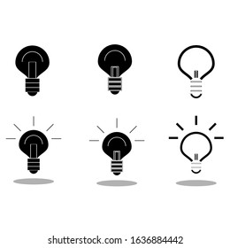 Set of light bulb designs. Simplistic black and white vector illustration. Flat minimalistic icon representing, energy, power and ideas.