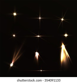 Set light effects yellow bright on dark background. Magic collection lights for holiday. Lights from the spotlights. Vector shiny light in space 