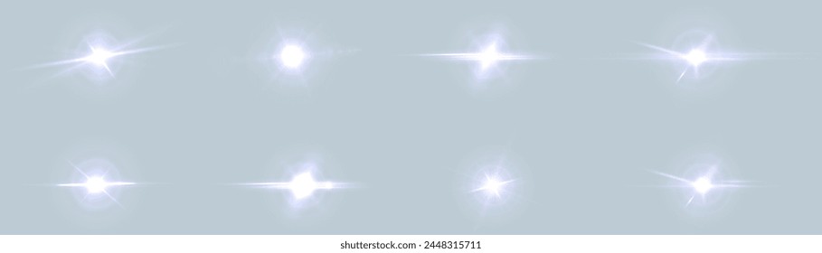 A set of light on a transparent background sparkles a shiny magic star. Glittering star, vector glowing star light effect.	
