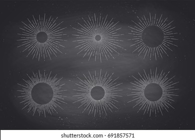 Set of light rays, sunburst and rays of sun. Design elements, linear drawing, vintage hipster style. Light rays sunburst for retro logo, emblem on black chalk board. Vector Illustration.