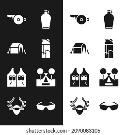 Set Lighter, Tourist tent, Whistle, Canteen water bottle, Hunting jacket, Glasses and Deer antlers on shield icon. Vector