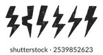 Set of lightning bolts with charcoal, pastel or crayon texture. Grunge doodle vector illustration.