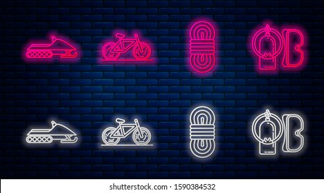 Set line Bicycle, Climber rope, Snowmobile and Diving mask and aqualung. Glowing neon icon on brick wall. Vector