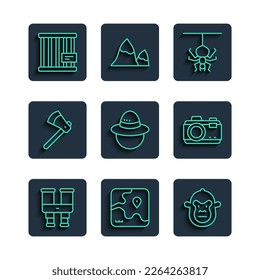 Set line Binoculars, Africa safari map, Monkey, Spider, Camping hat, Wooden axe, Animal cage and Photo camera icon. Vector