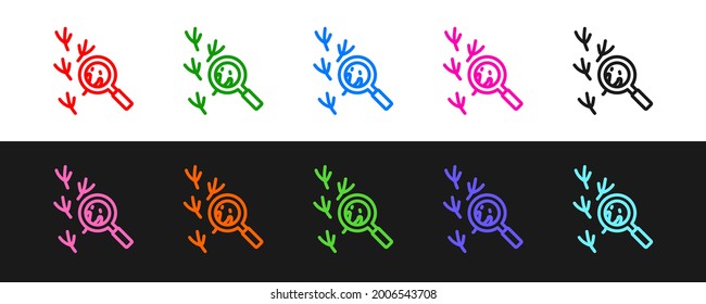 Set line Bird footprint under magnifying glass icon isolated on black and white background. Animal foot.  Vector