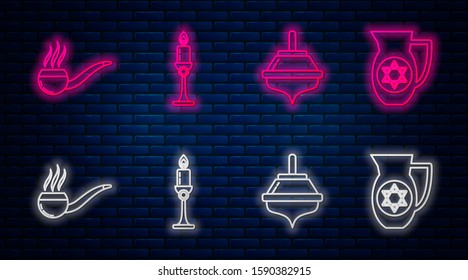 Set line Burning candle in candlestick, Hanukkah dreidel, Smoking pipe with smoke and Decanter with star of david. Glowing neon icon on brick wall. Vector