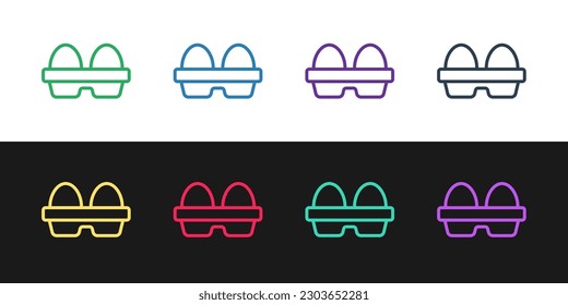 Set line Chicken egg in box icon isolated on black and white background.  Vector