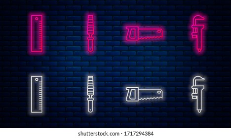 Set line Chisel tool for wood, Hand saw, Ruler and Calliper or caliper and scale. Glowing neon icon on brick wall. Vector