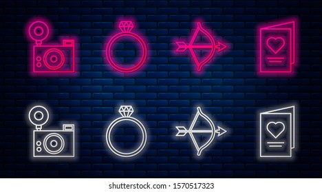 Set line Diamond engagement ring, Bow and arrow, Photo camera and Valentines day party flyer with heart. Glowing neon icon on brick wall. Vector