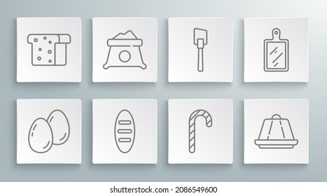 Set line Easter eggs, Bag of flour, Bread loaf, Christmas candy cane, Pudding custard, Spatula, Cutting board and toast icon. Vector