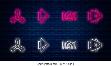 Set line Fish, Photo camera, Boat propeller, turbine and . Glowing neon icon on brick wall. Vector