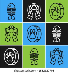 Set line Fish skeleton, Paw print and Hands with animals footprint icon. Vector