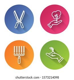 Set line Gardening handmade scissors for trimming, Tree in hand of environmental protection, Garden rake in work and Sprout in hand of environmental protection. Color circle button. Vector
