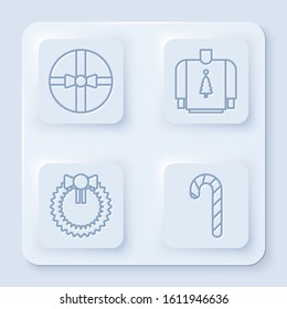 Set line Gift box, Christmas sweater, Christmas wreath and Christmas candy cane with stripes. White square button. Vector