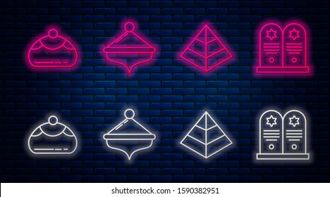 Set line Hanukkah dreidel, Egypt pyramids, Jewish sweet bakery and Tombstone with star of david. Glowing neon icon on brick wall. Vector