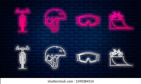 Set line Helmet, Ski goggles, Bicycle and Bicycle on street ramp. Glowing neon icon on brick wall. Vector